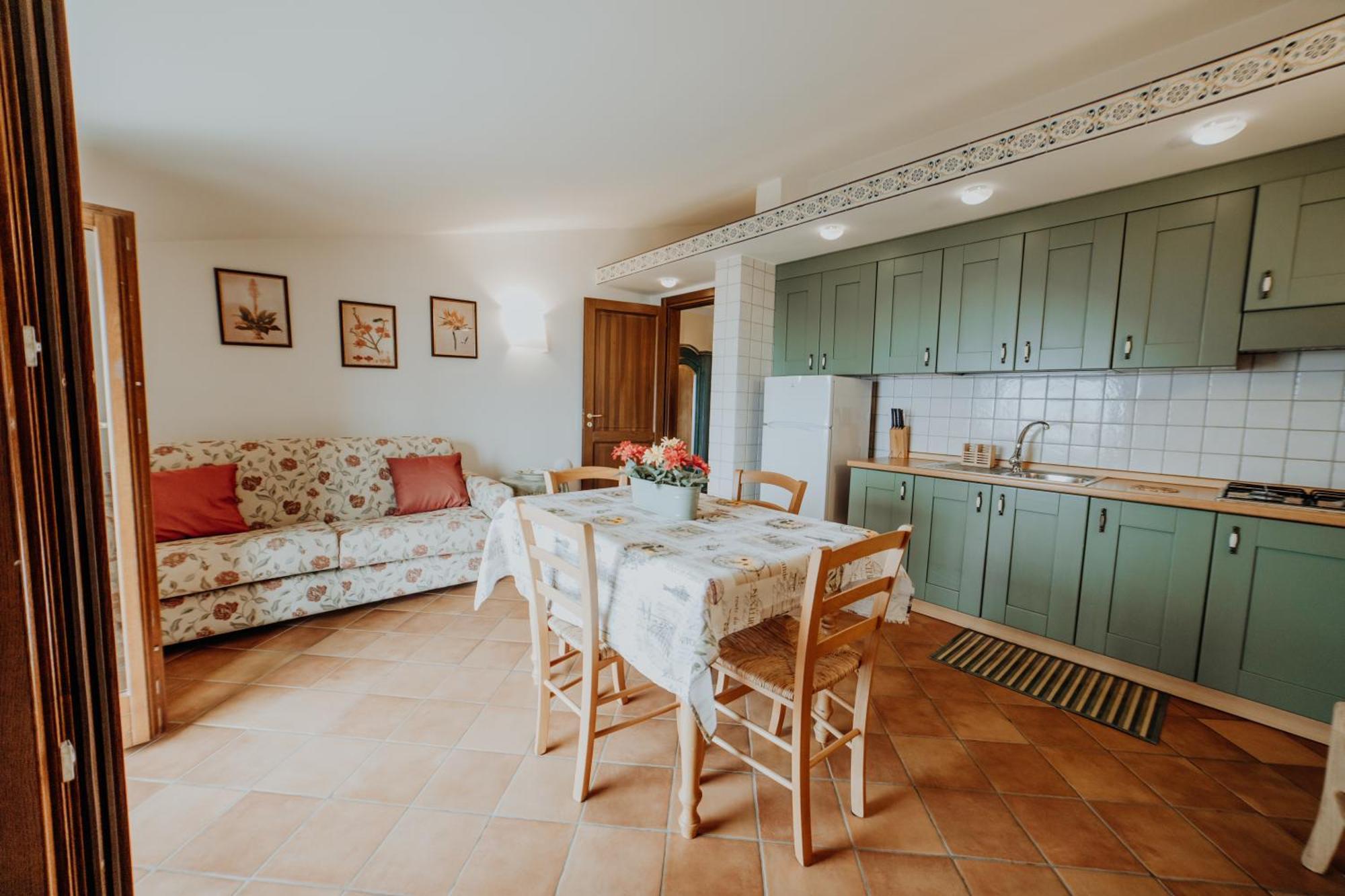 Residenza Golfo Degli Ulivi Aparthotel Каприоли Екстериор снимка